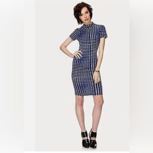 Forever 21 stretchy knee length dress, patterned in blue, white, & black.